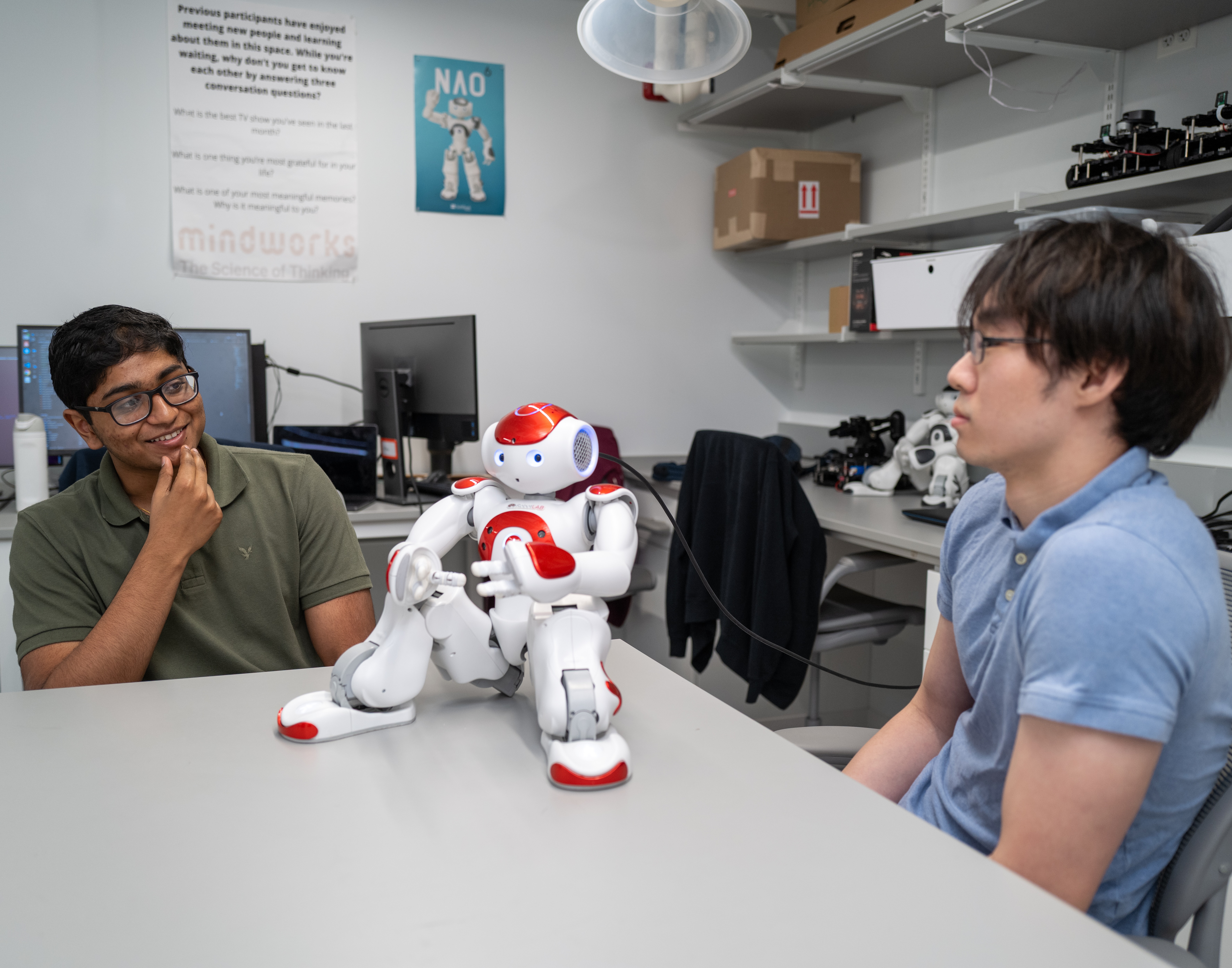 Exploring How Robots can Influence Human-Human Interactions Research